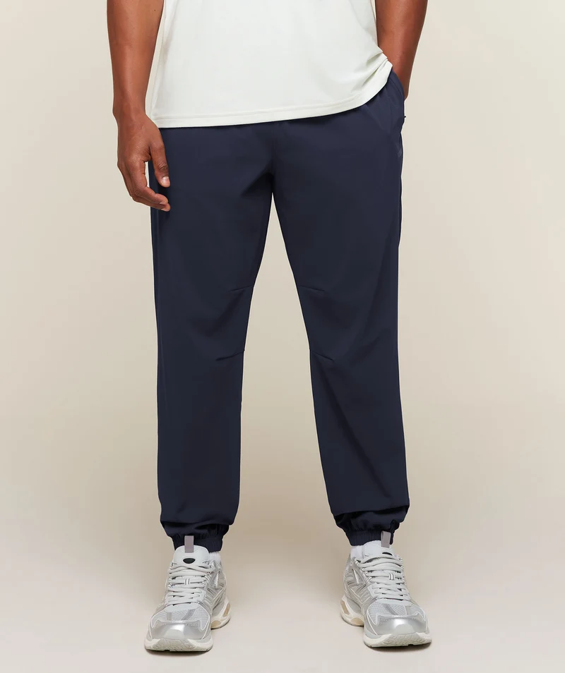 Gymshark Campus Crest Cuffed Woven Pant - Heavy Blue