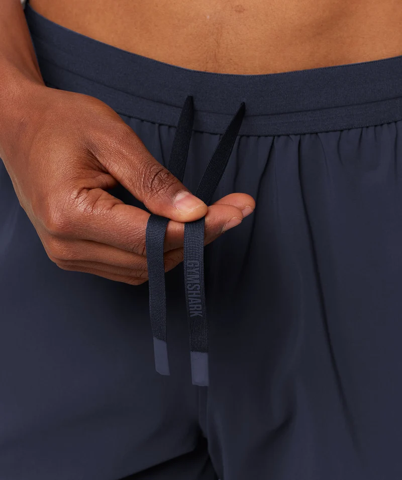 Gymshark Campus Crest Cuffed Woven Pant - Heavy Blue