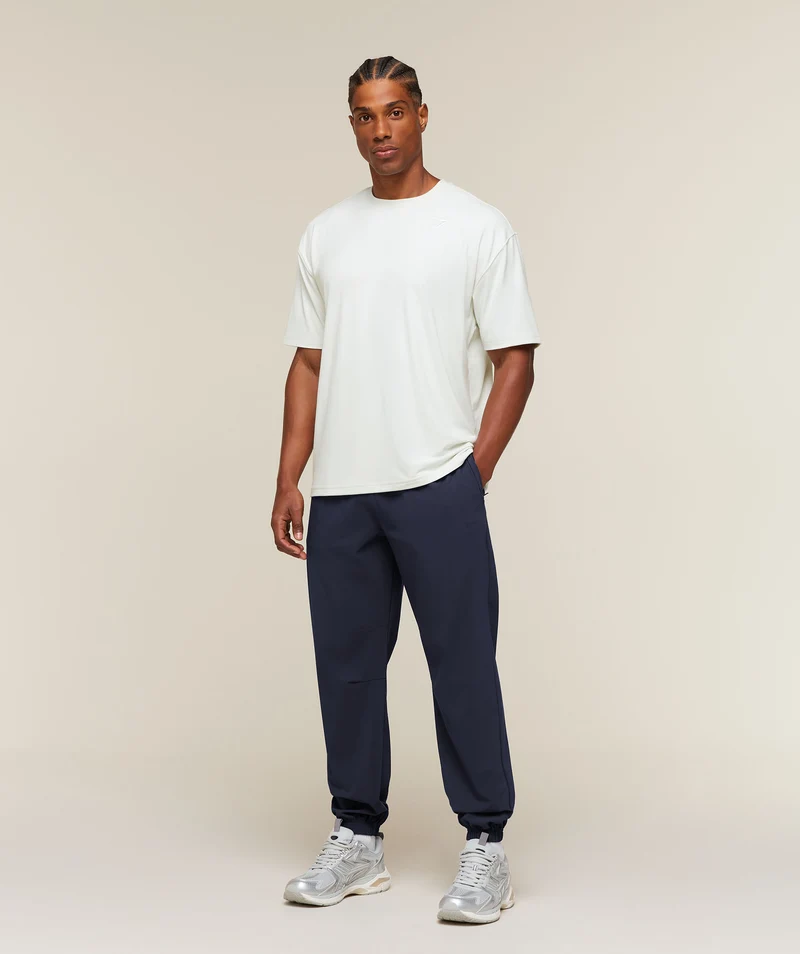 Gymshark Campus Crest Cuffed Woven Pant - Heavy Blue