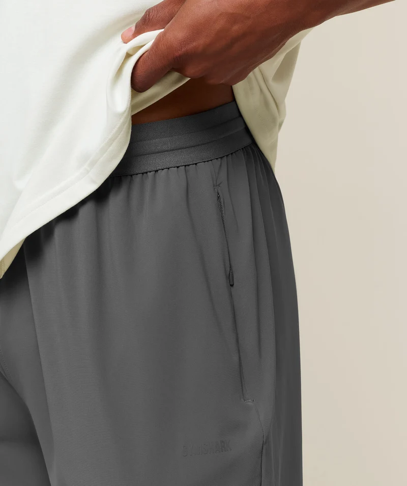 Gymshark Campus Crest Cuffed Woven Pant - Dark Grey