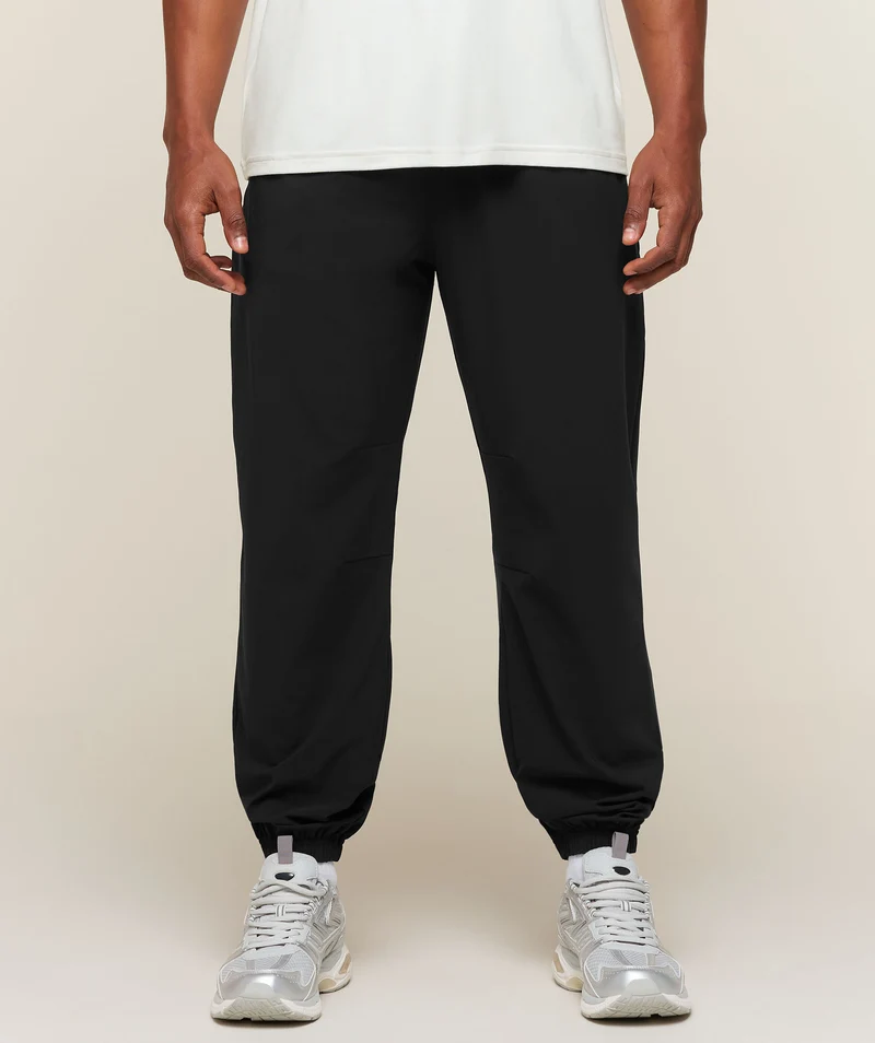 Gymshark Campus Crest Cuffed Woven Pant - Black