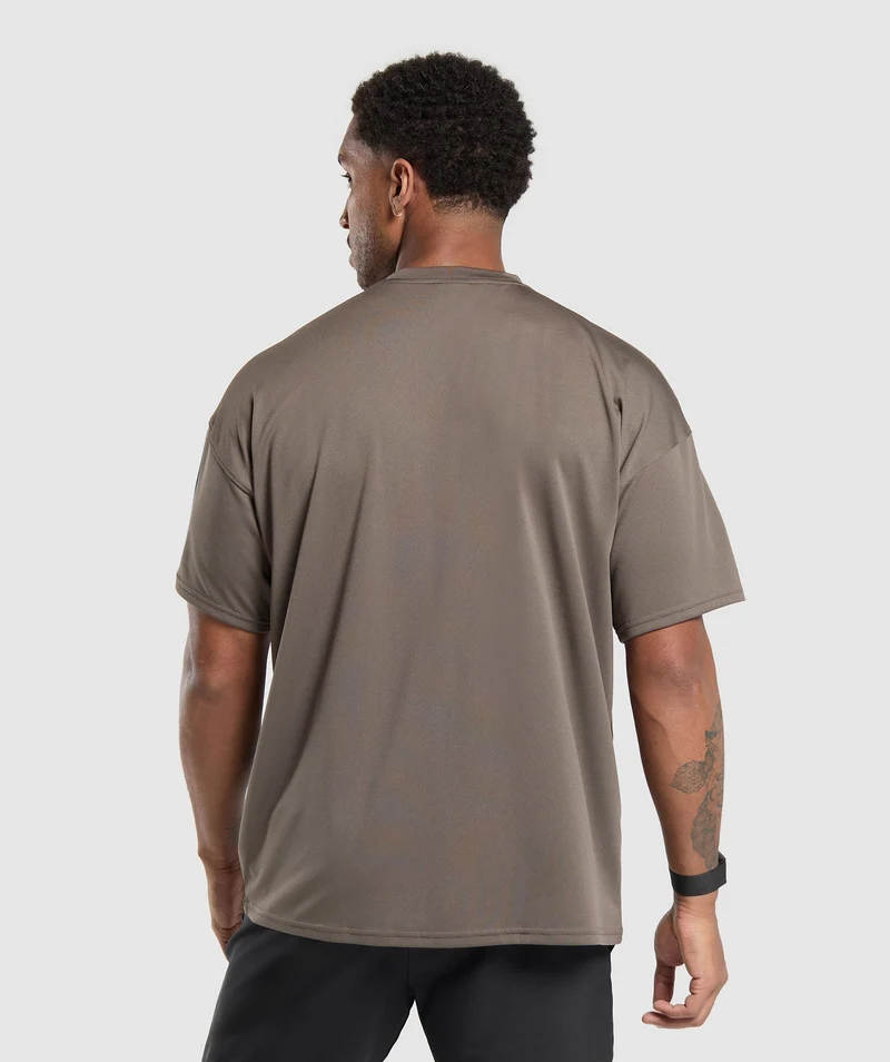 Gymshark Arrival Oversized T-Shirt - Camo Brown