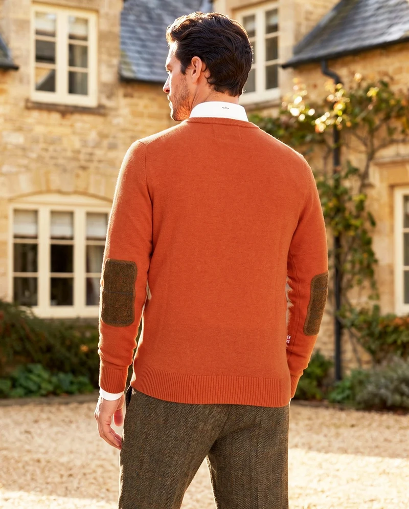Merino-Lambswool Herrenpullover "Jordan" in burned orange – mit Harris-Tweed-Details