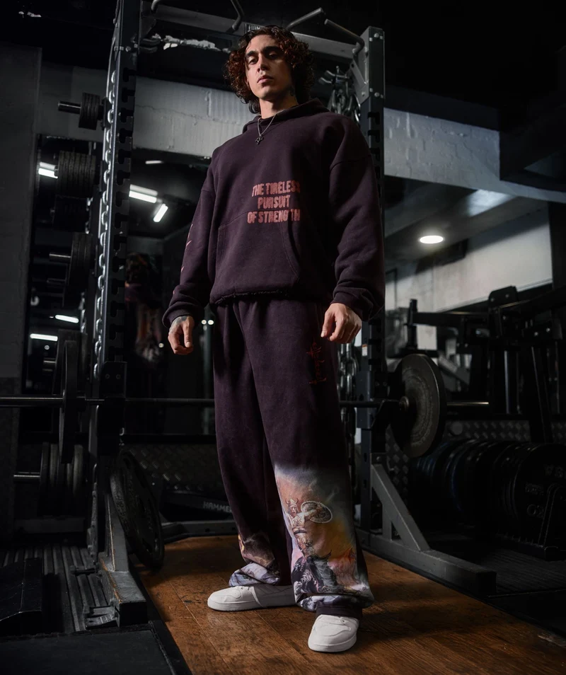 Gymshark Frazetta Graphic Jogger - Asphalt Grey/Plum Brown