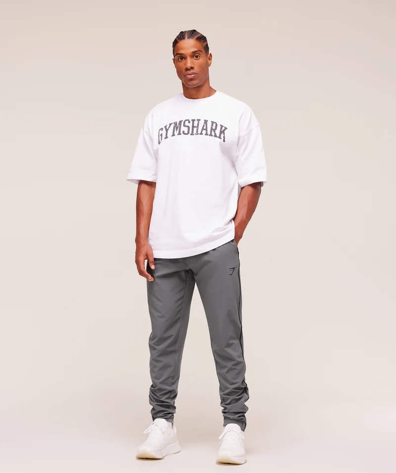 Gymshark Arrival Woven Block Joggers - Dark Grey