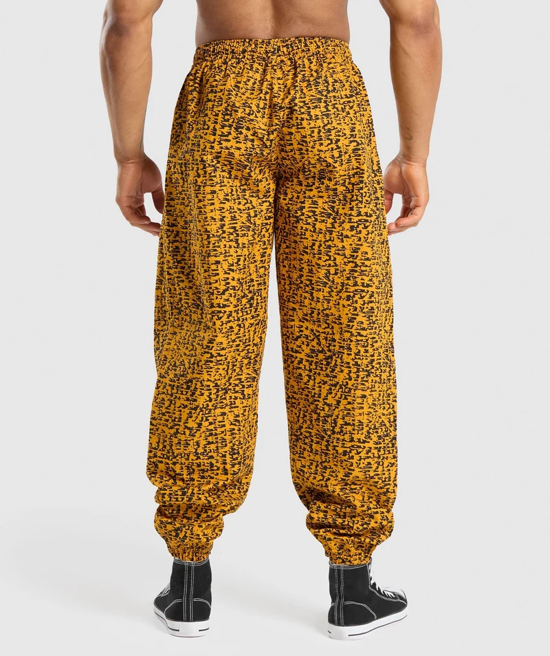 Gymshark Lifting Oversized Printed Woven Joggers - Burnt Yellow