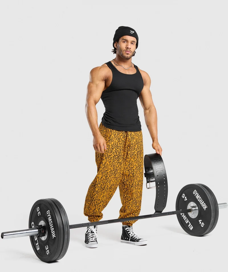 Gymshark Lifting Oversized Printed Woven Joggers - Burnt Yellow