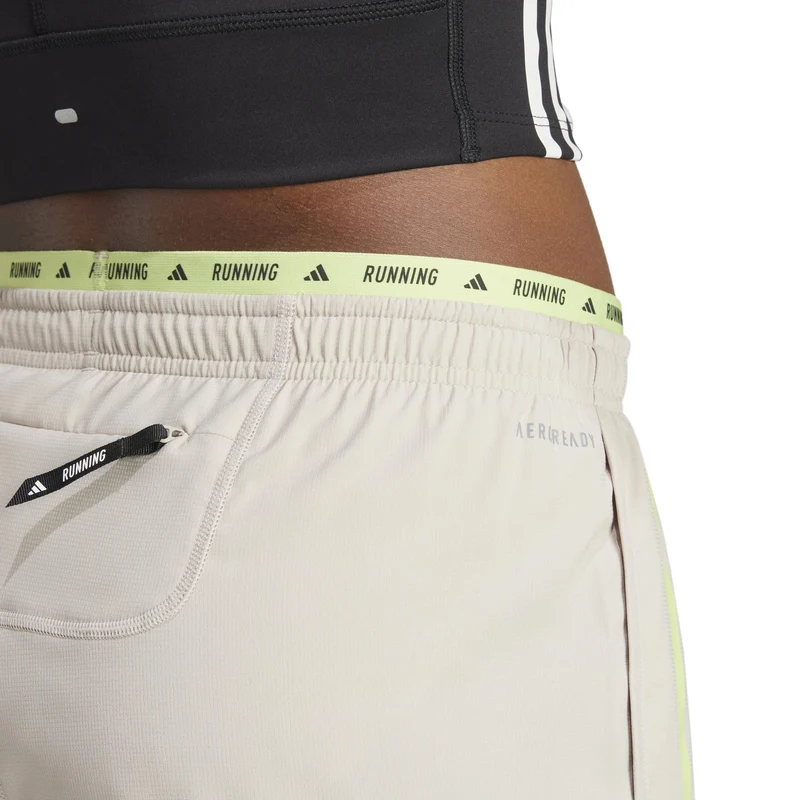 Own The Run 3S Laufshorts Damen-Beige